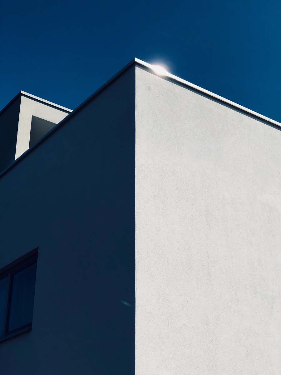 anna van burenstraat 16 low-angle photography of concrete building under blue sky 3116 cj schiedam